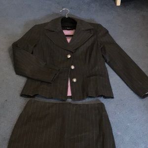Tailored suit with rhinestone buttons